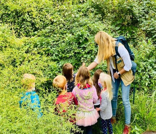 June Mini-Camp campers exploring Sheldrake grounds with a naturalist.