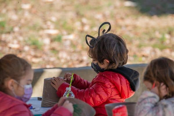 Kids at Sheldrake birthday party working on nature crafts.