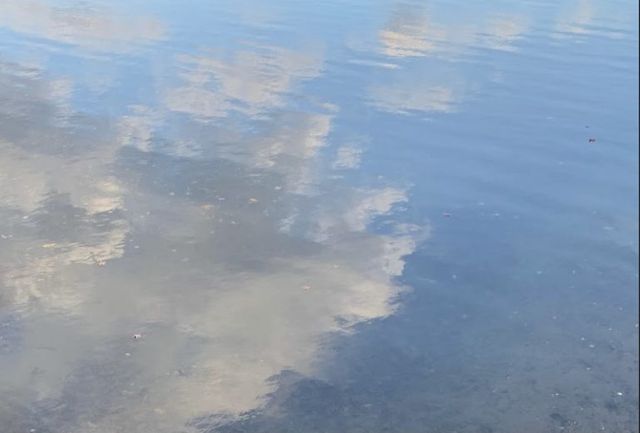 Clouds reflecting in water.